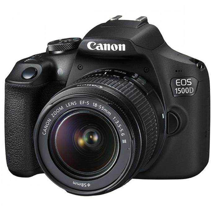 Canon EOS 500D (Rebel T1i) DSLR Camera with 18-55mm kit lens shooting outdoors